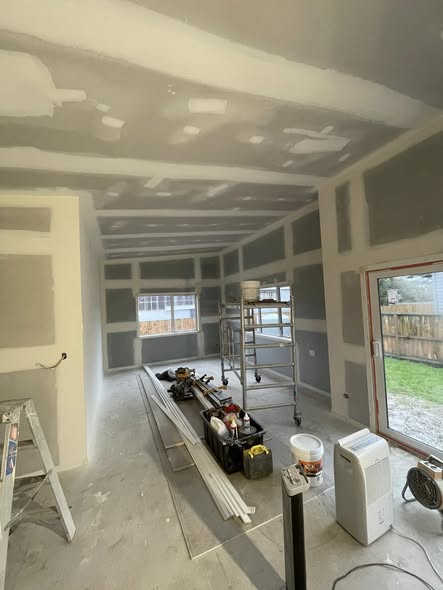 Pat's recent vaulted ceiling work, fresh gib stopping under exposed roof structure